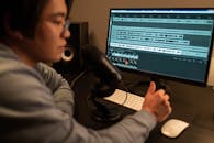 A Man Sitting at the Table