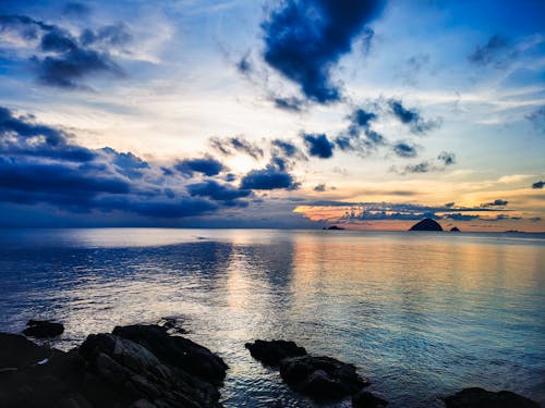 Photos gratuites de asie, beau coucher de soleil, bord de mer