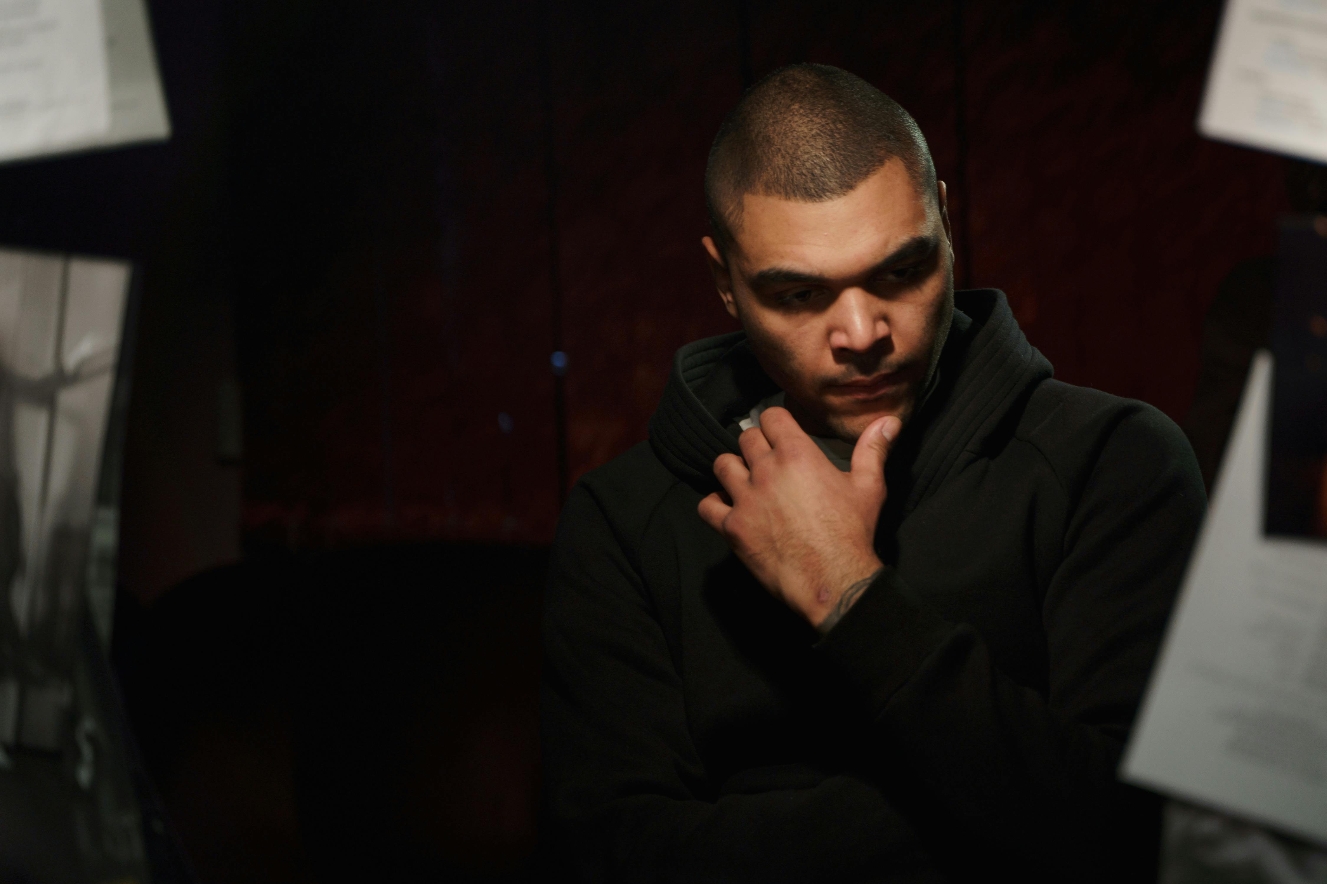 Spotlight on a Red Curtain · Free Stock Photo