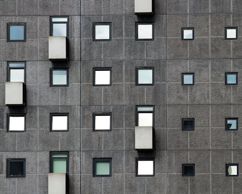 Free 
Windows and Balconies of an Apartment Building Stock Photo