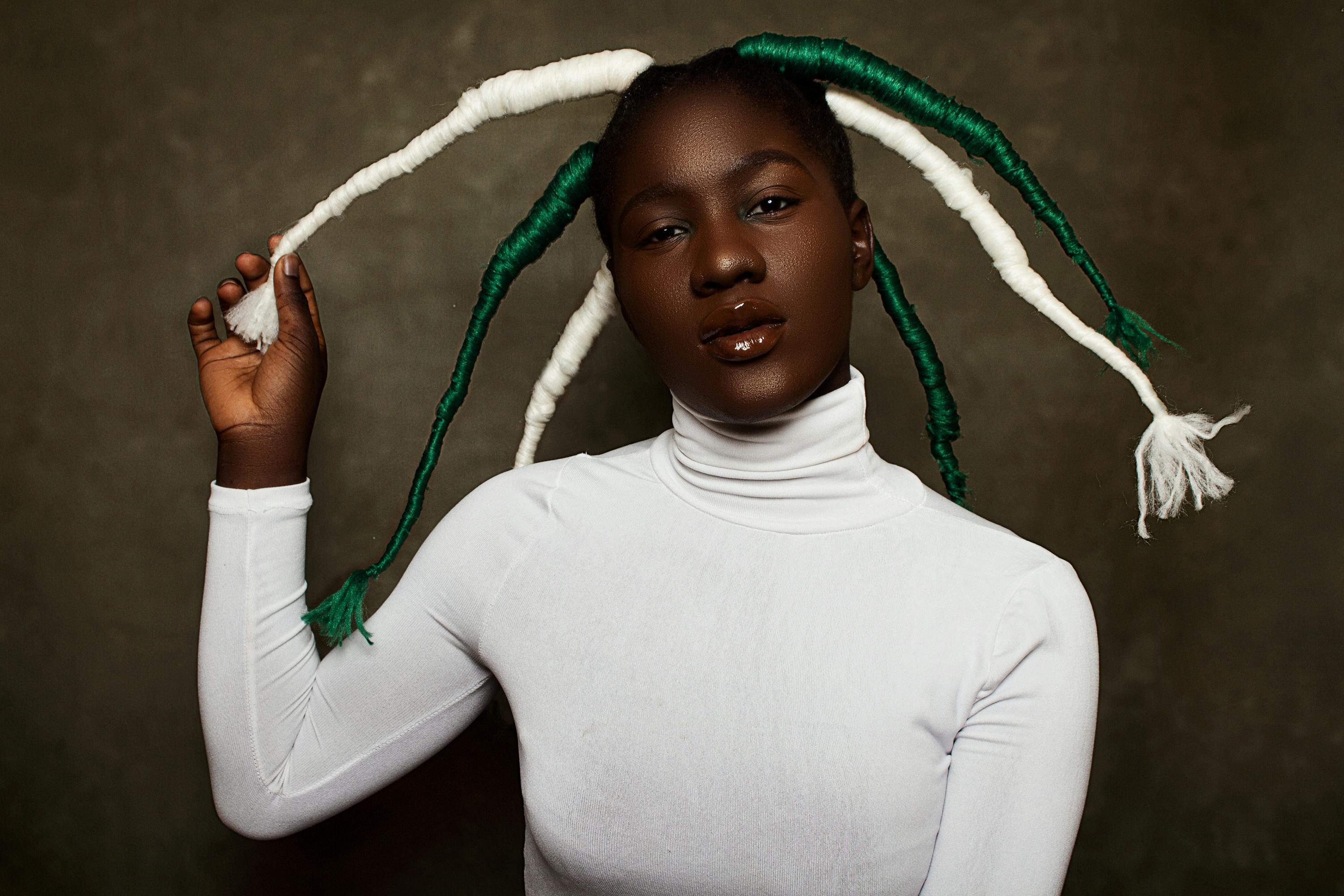 Healthy natural hair growth showing the placement of a keratin bond after several weeks - fusion hair extensions price