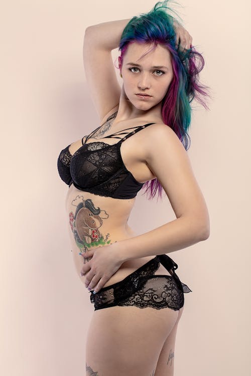 Free 
A Tattooed Woman in a Lingerie Stock Photo