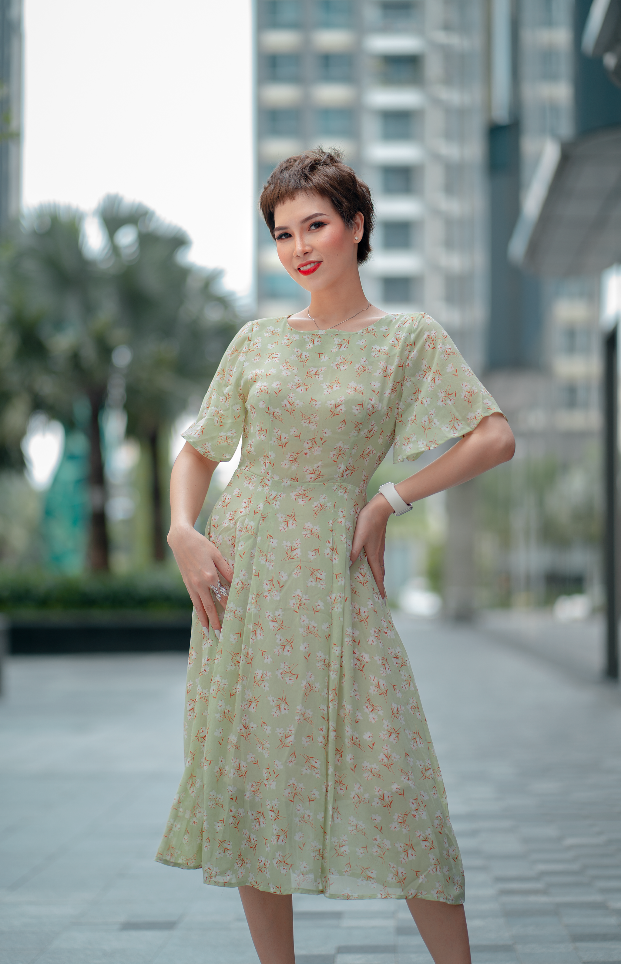 Woman in White and Pink Floral Dress Standing on Road · Free Stock Photo