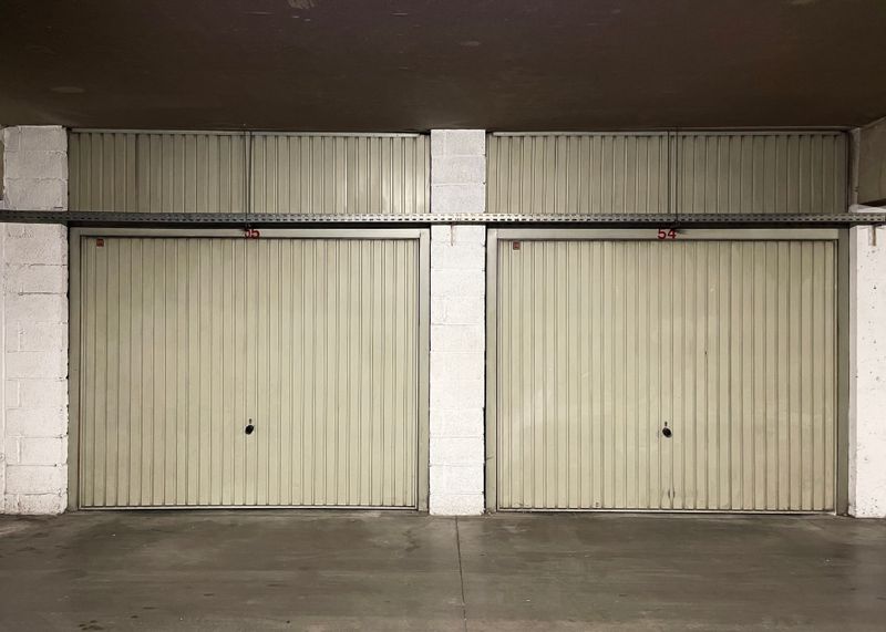 Clean off-white double roll-up garage doors