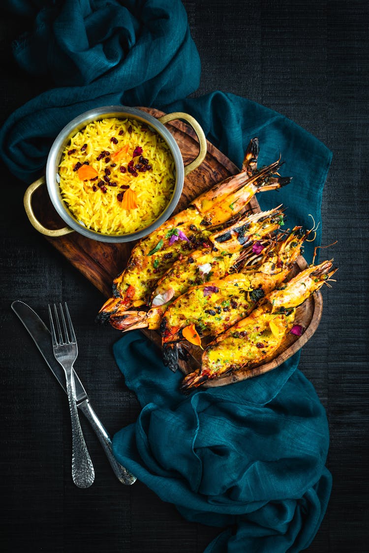 Baked Shrimp On A Wooden Plate