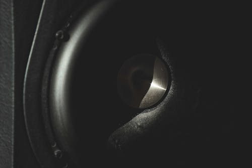 Free Closeup of black round sound acoustic speaker for playing loud music and sounds Stock Photo