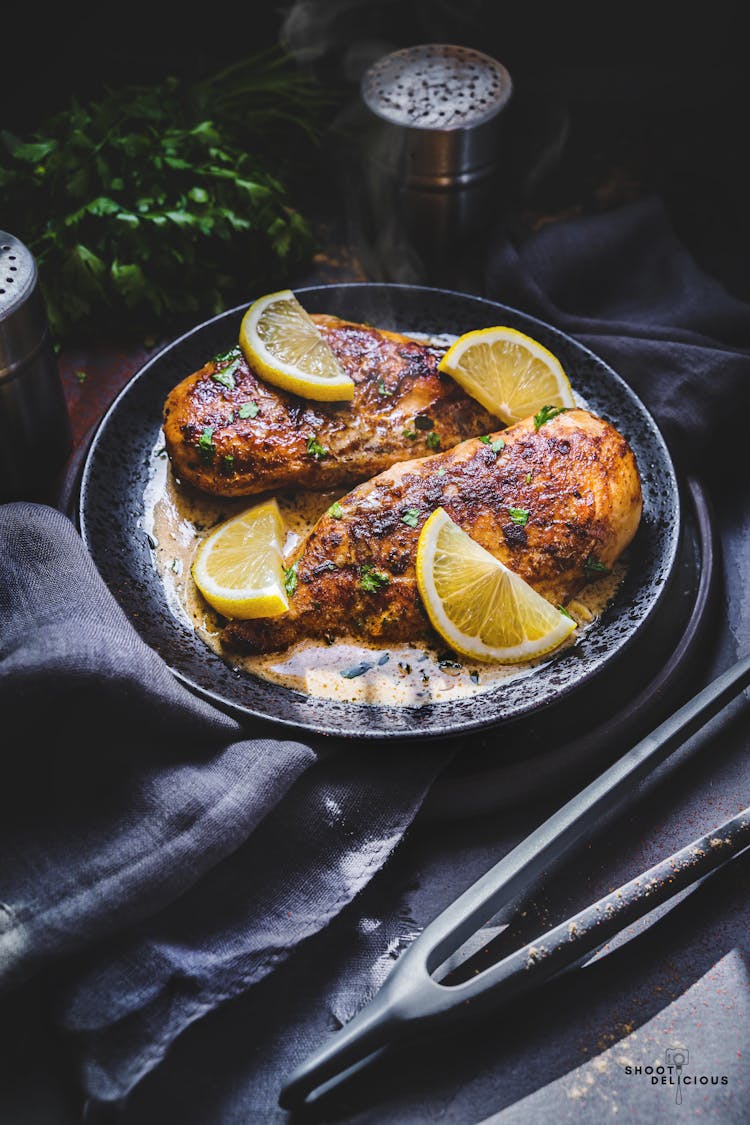 A Delicious Roasted Chicken With Lemon Slices