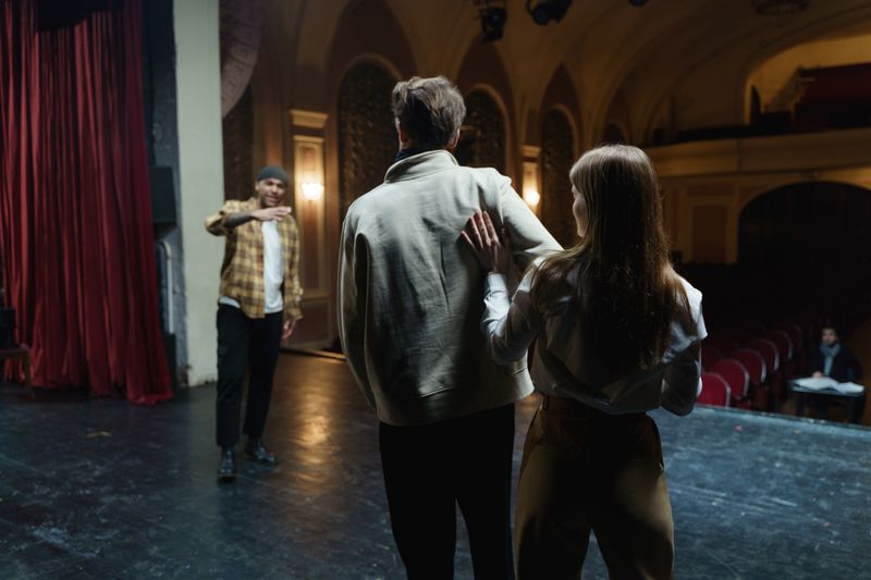 Two acting students discussing a scene during class
