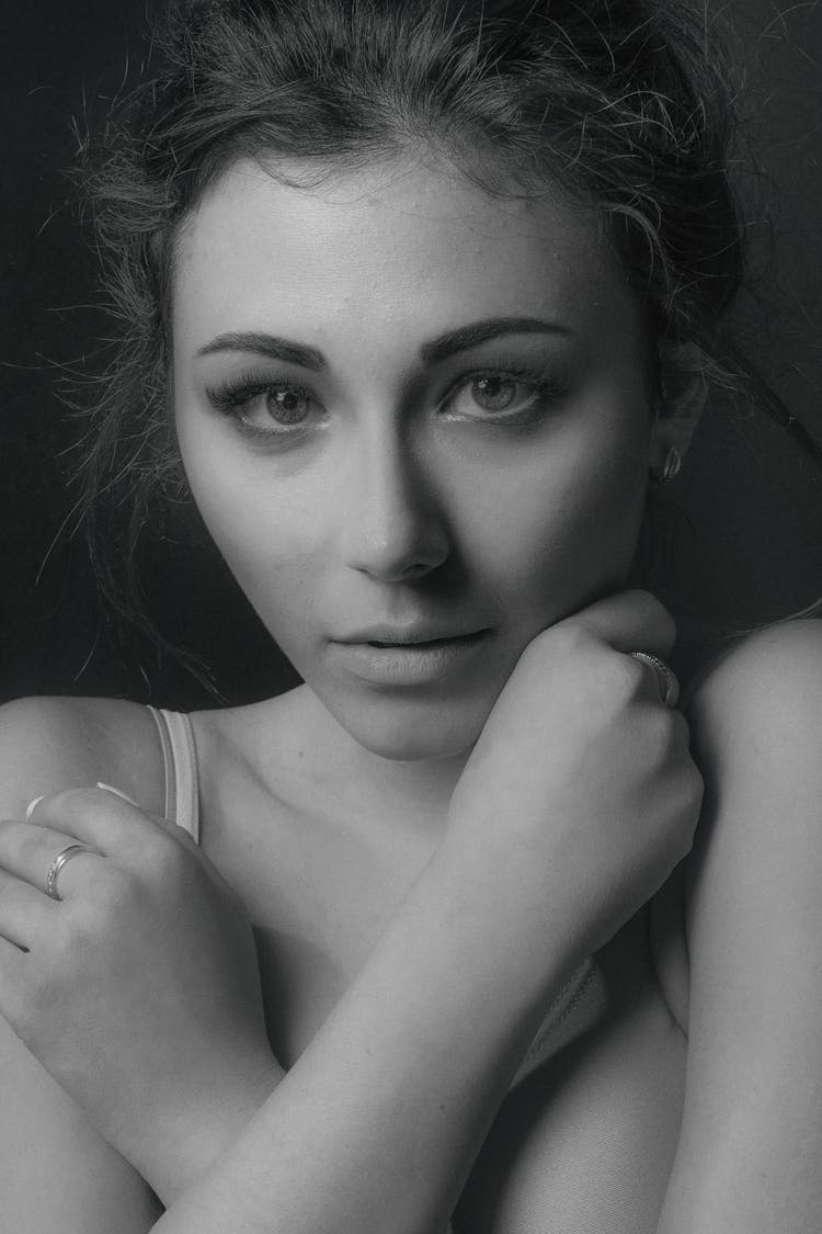 Grayscale Photo Of Woman With Hands Crossed On Her Chest 