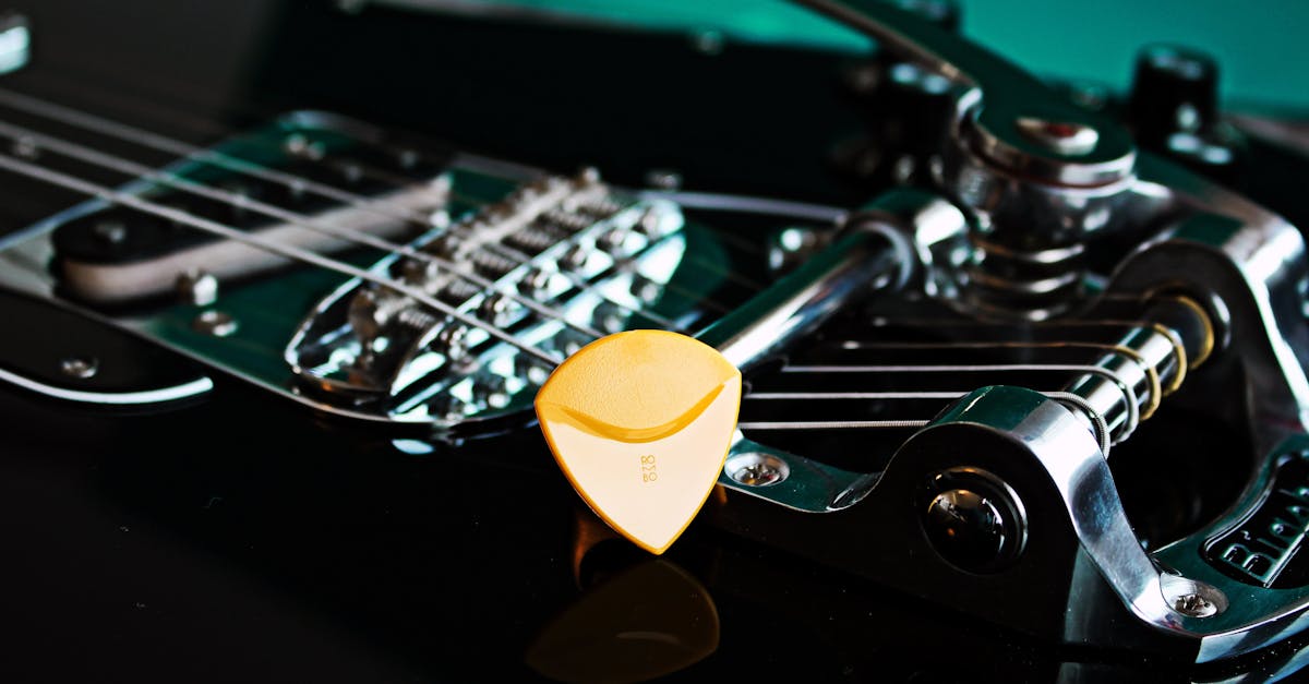 How to change guitar strings with bridge pins