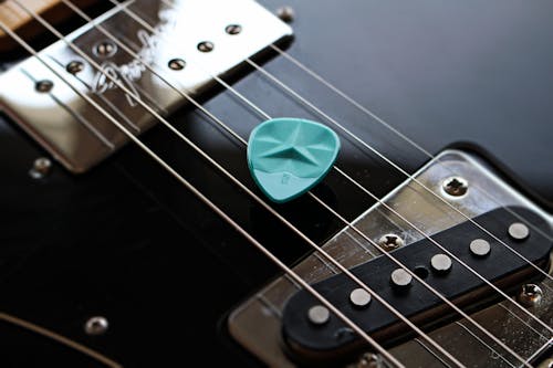 A Green Electric Guitar Pick