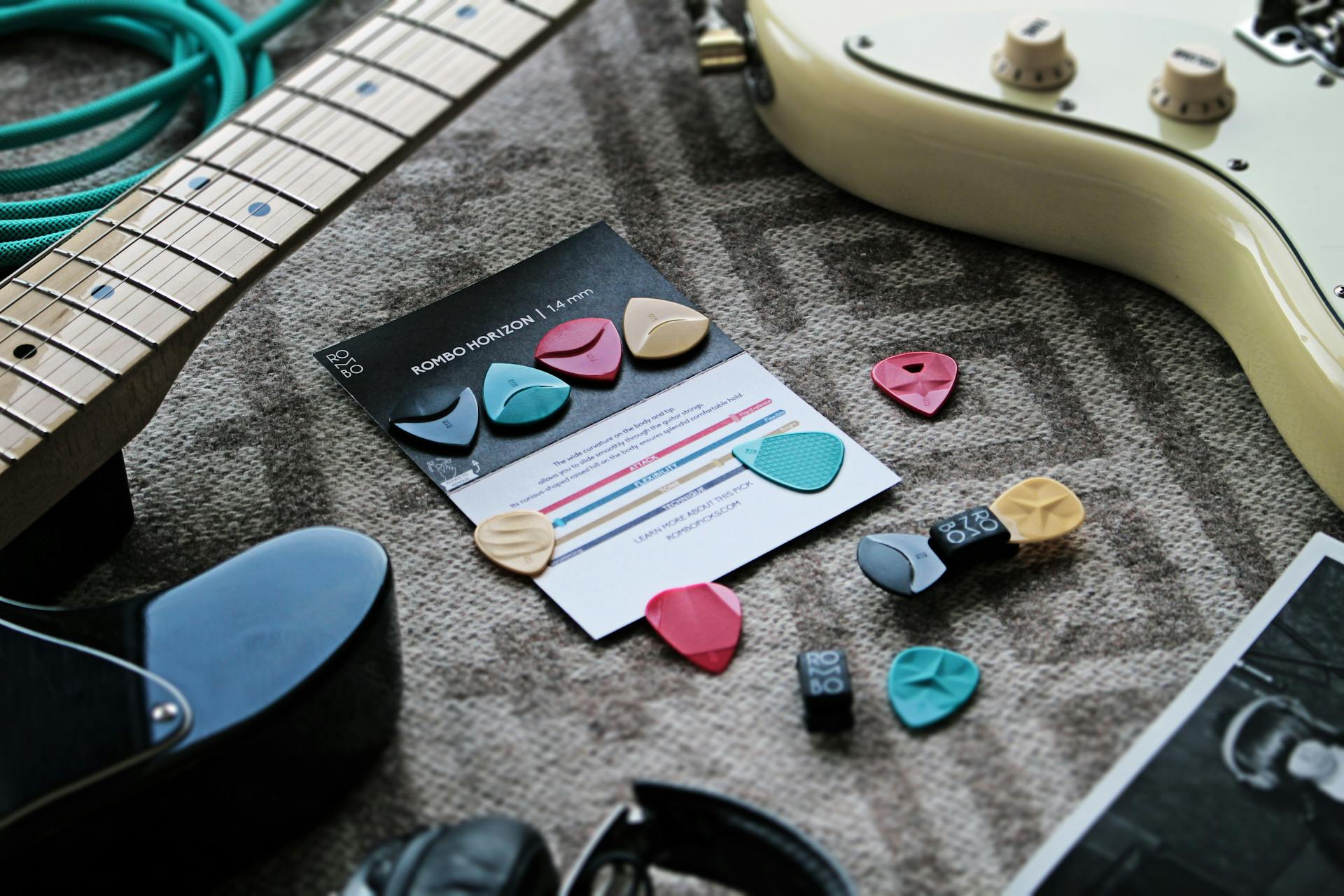 Assorted Rombo Horizon Guitar Picks Near Guitars