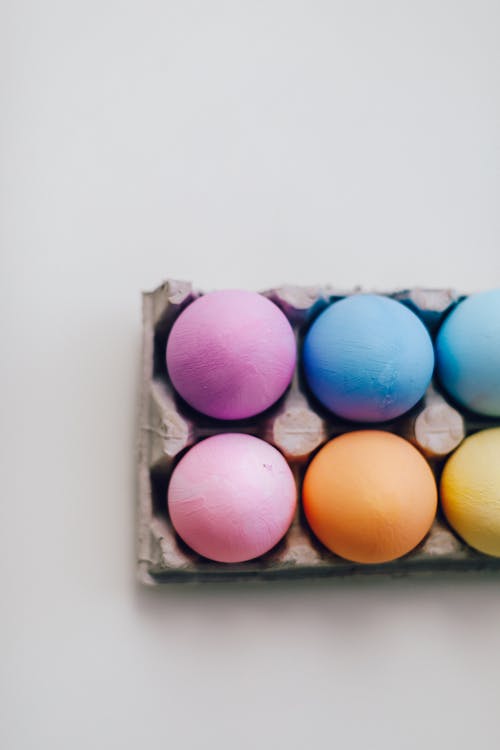 Colored Eggs In A Carton
