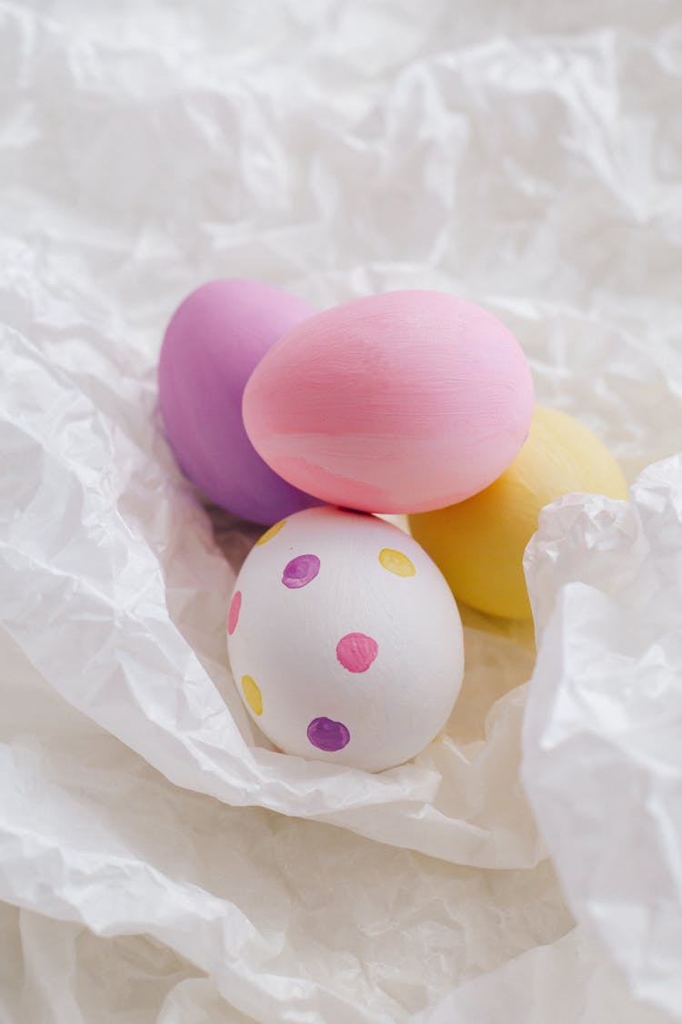 Colored Eggs And Polka Dots On White Textile