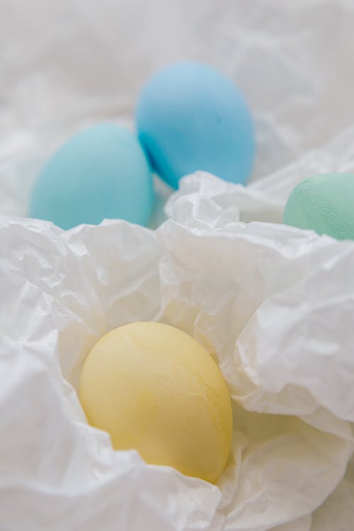 Colored Eggs On White Surface