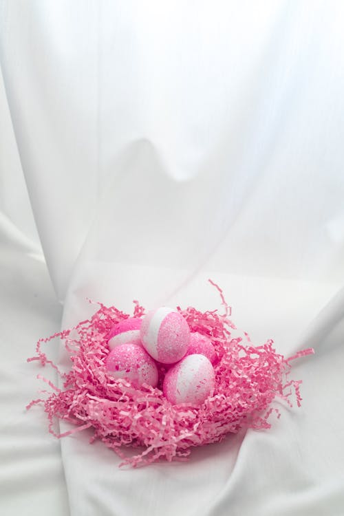 Free Pink Eggs On Pink Nest Stock Photo