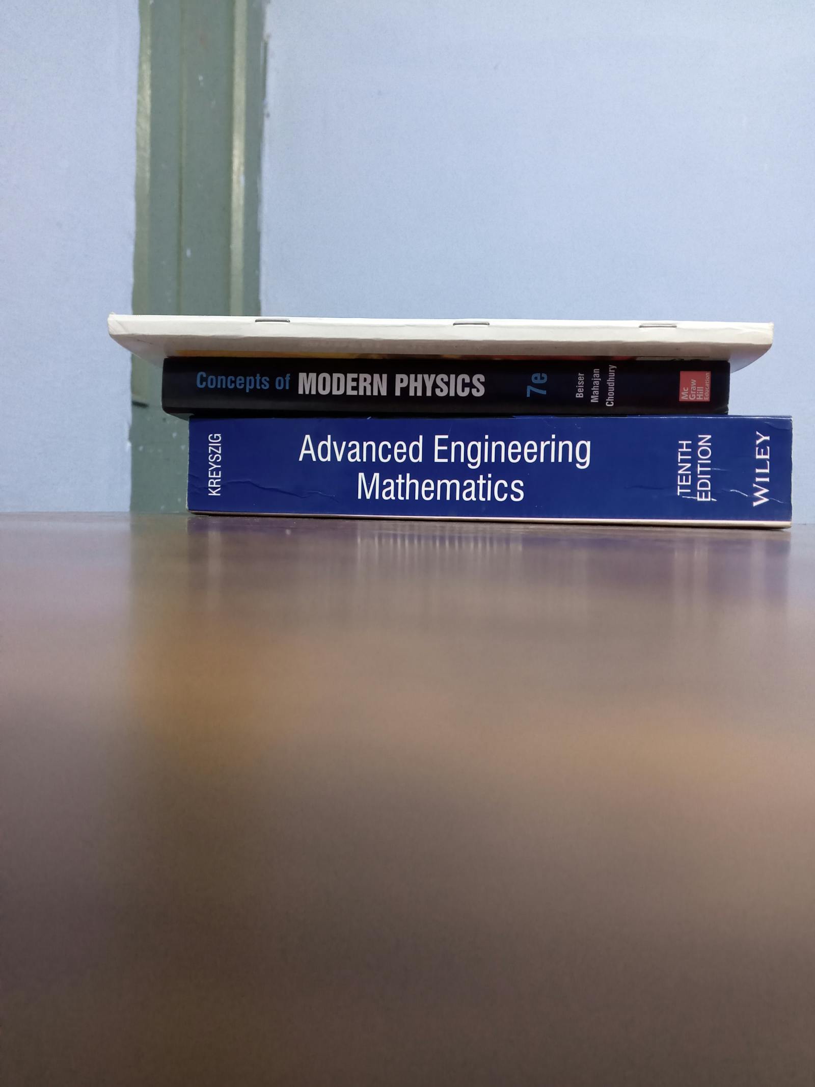 Laptop screen showing waveforms and algorithms, symbolizing AI in music production