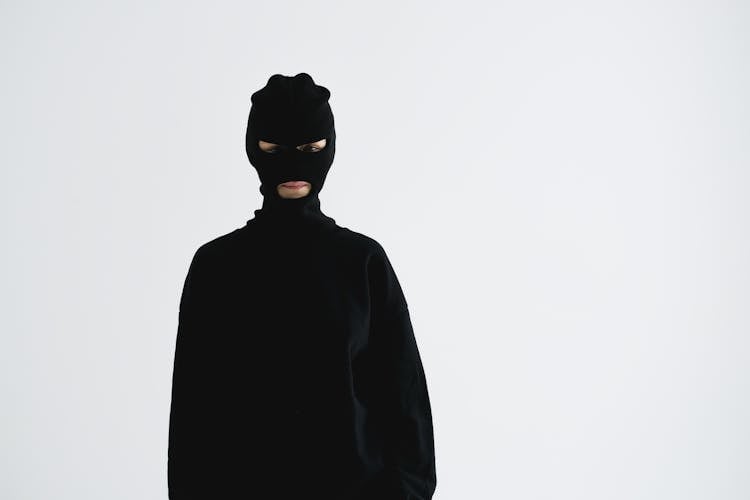 Man Wearing All Black And A Balaclava 