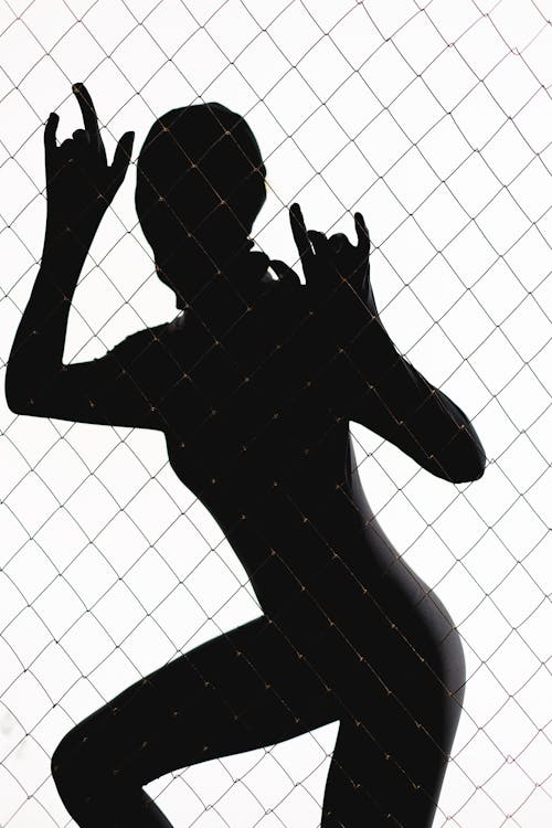 girl shot put silhouette