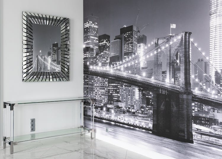 Room Interior With City Wall Mural Near Table And Mirror