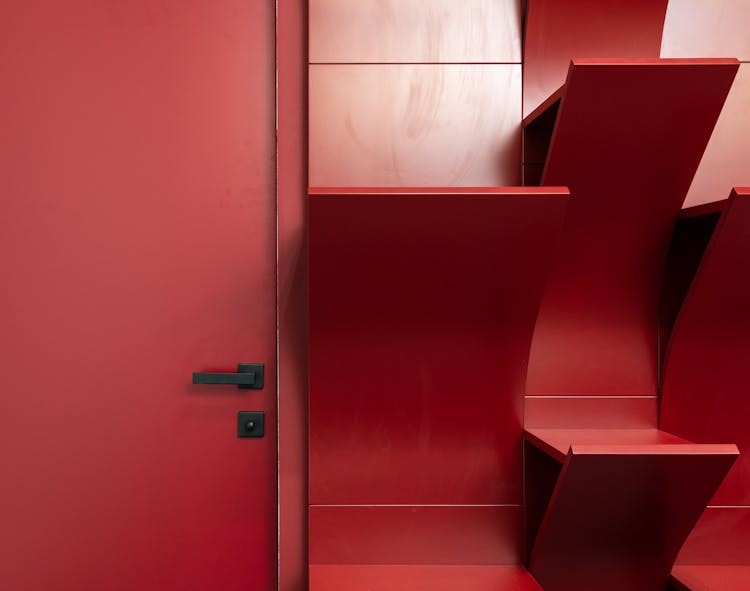 Red Shelves Near Door In Office