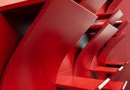 Modern red shelves on wall in room