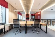 Office interior with table and chairs near window