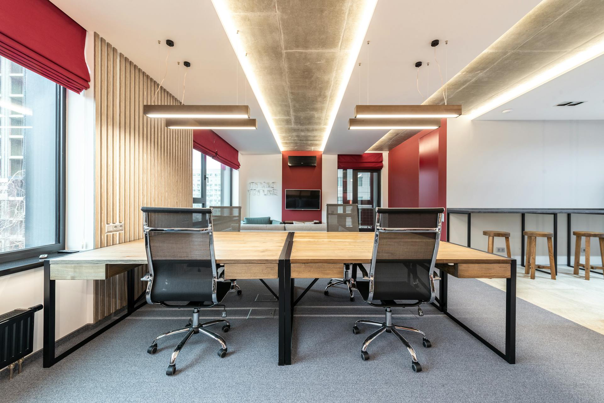 Office interior with table and chairs near window