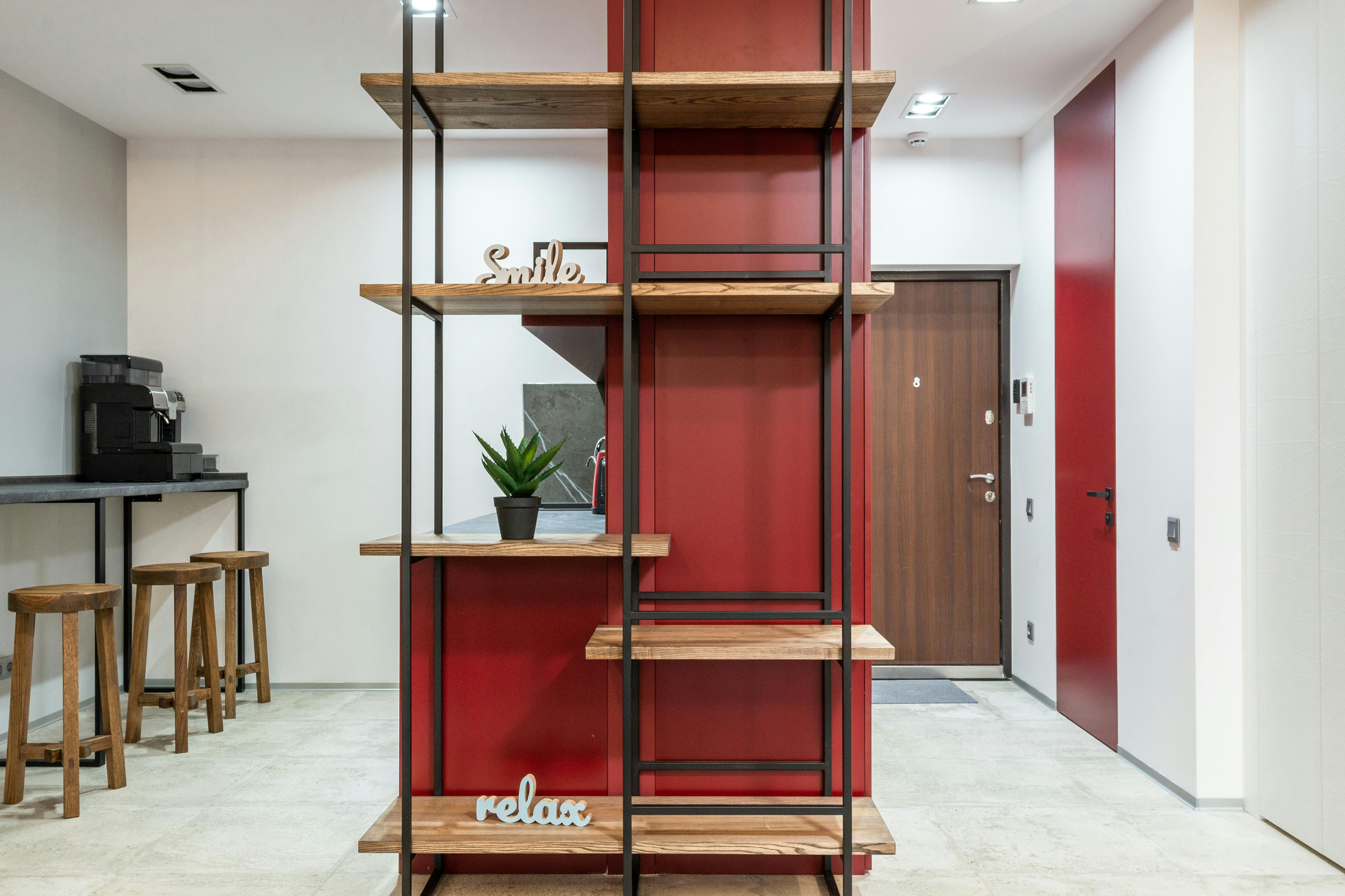 office with shelves near stools with counter