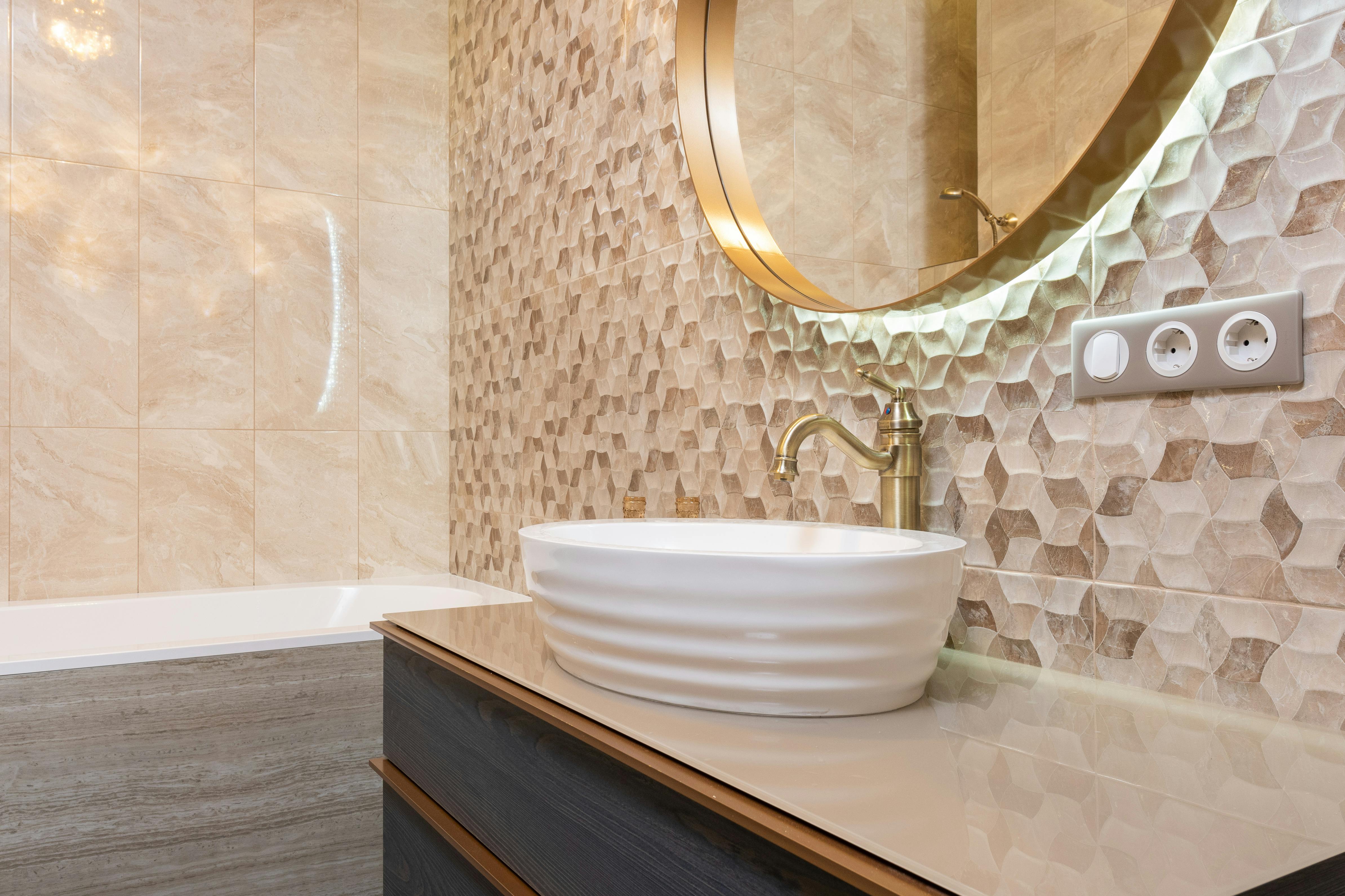 bathroom interior with sink on cabinet near bath