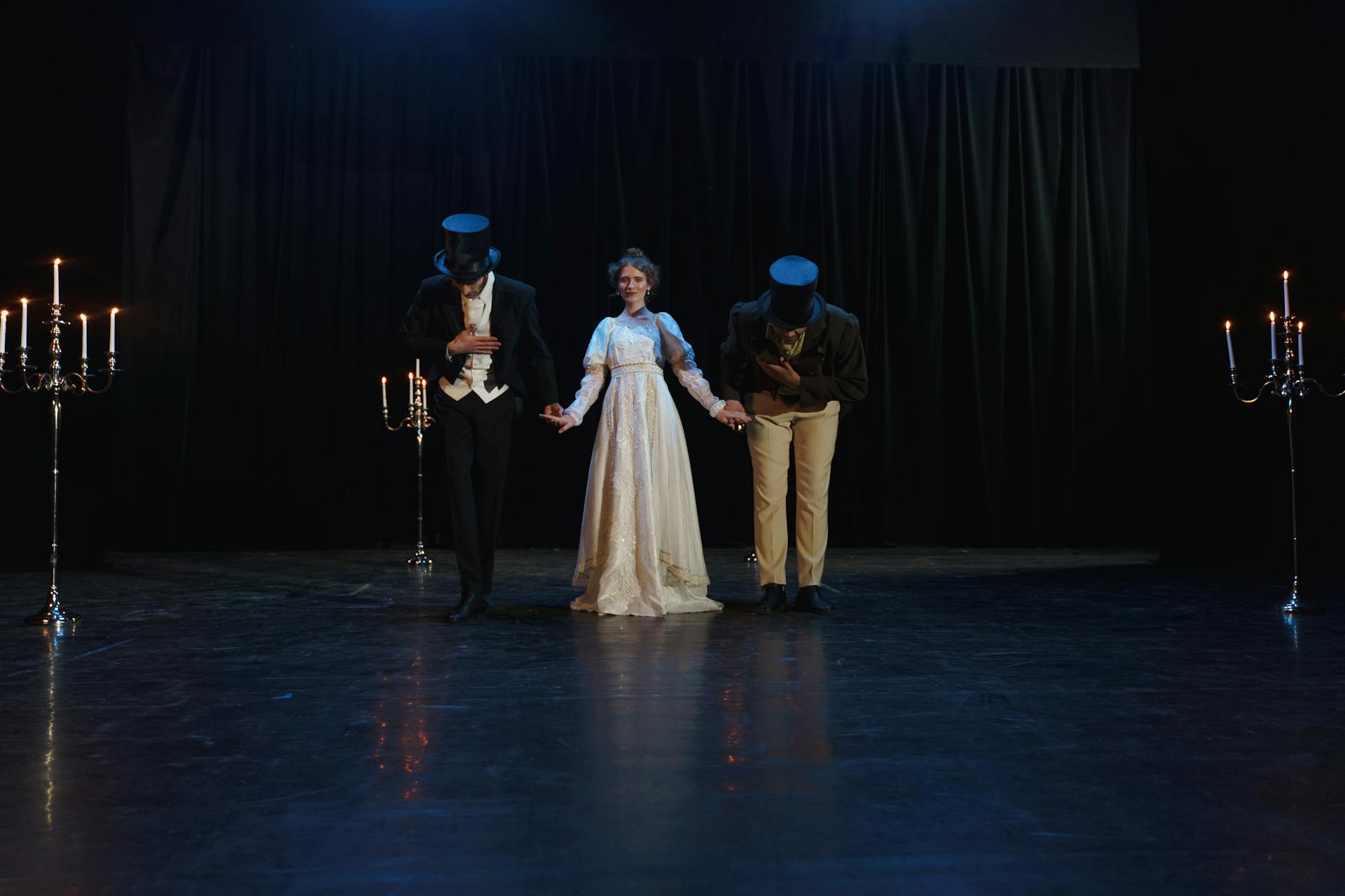 Men and Woman Making A Bow After Show