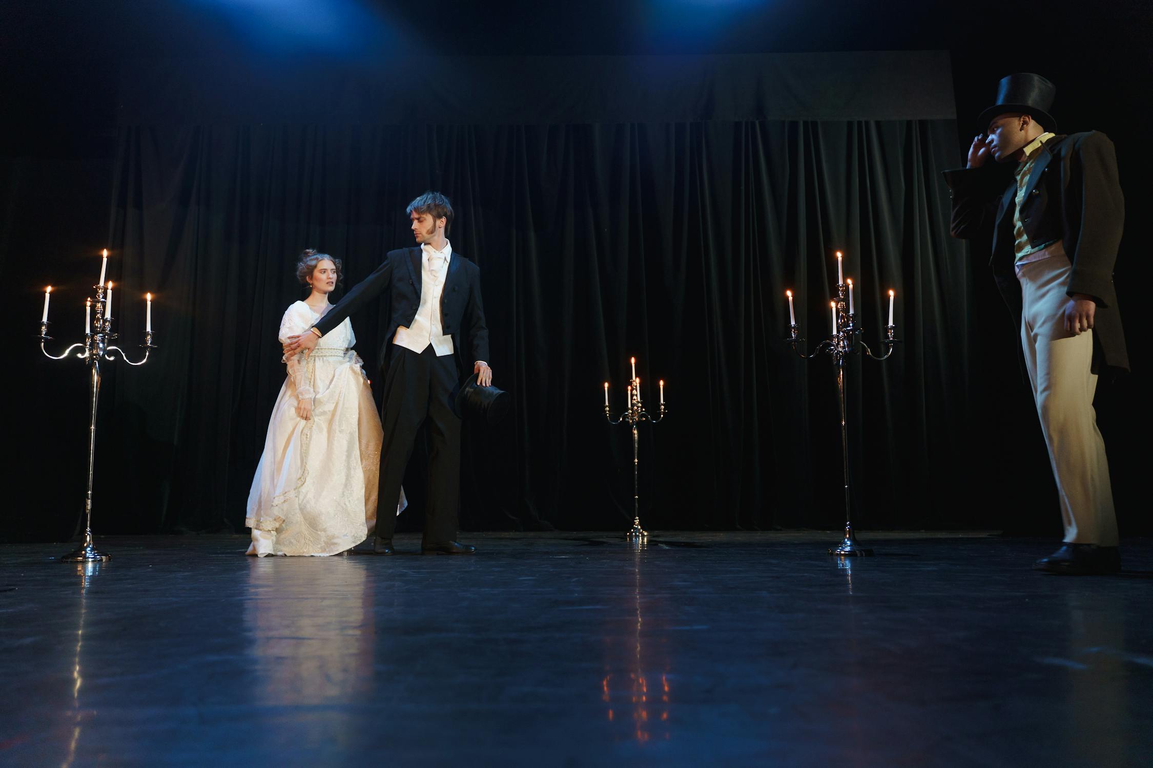 Two Men And Woman Acting On Stage · Free Stock Photo