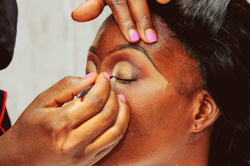 A Person Doing an Eye Make Up