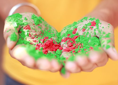 Free Close-up of colorful Holi powders in hands, celebrating the vibrant festival of colors. Stock Photo