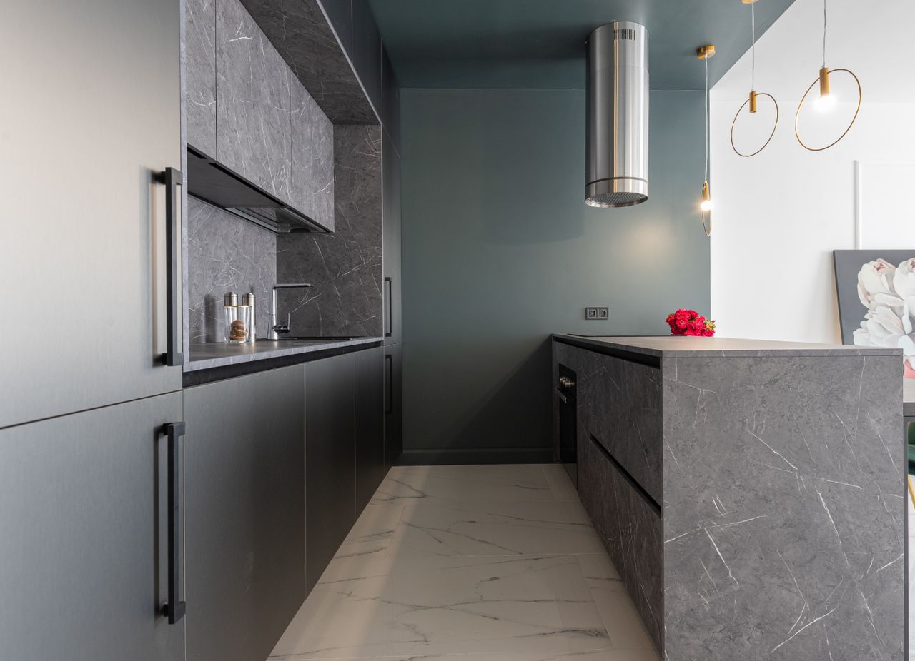 slate-blue-gray-kitchen-cabinets Modern kitchen interior with gray furniture