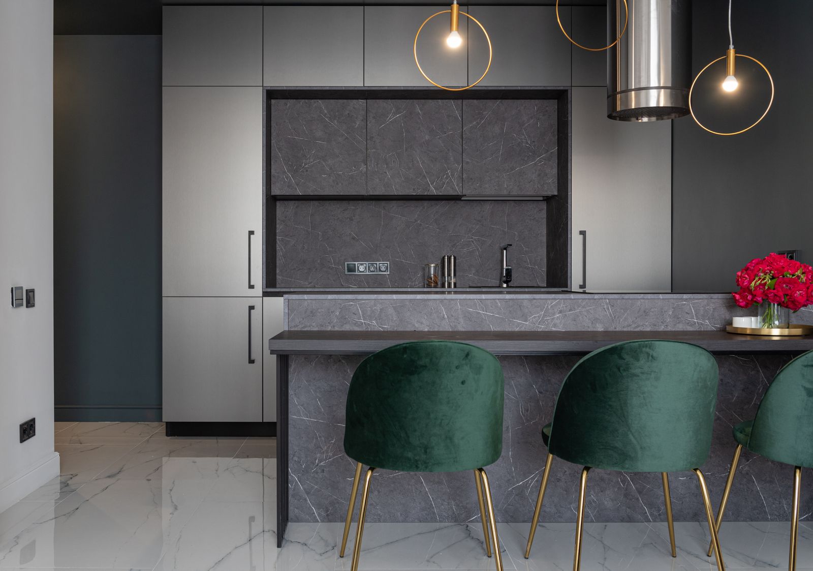 A bespoke kitchen with slab-matched marble and integrated lighting