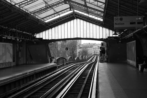 Grayscale Photo of Train Station