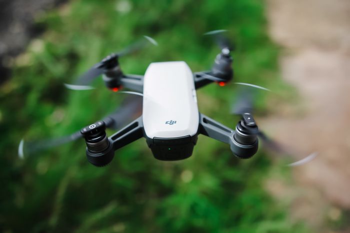 A quadcopter drone hovering after a repair