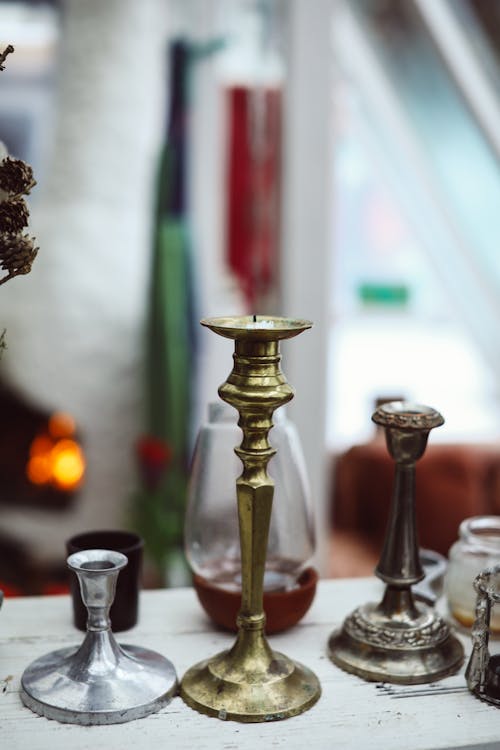 Gold Candle Holders on the Table