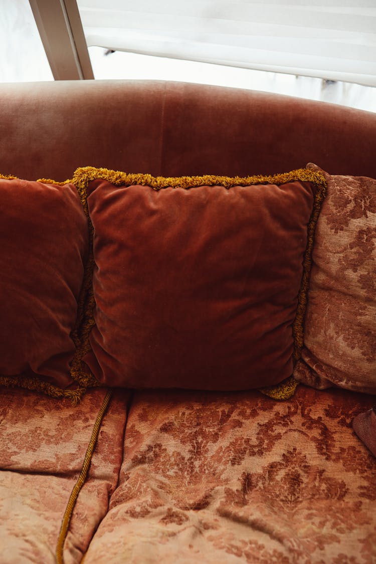 Brown Throw Pillow On Brown Couch