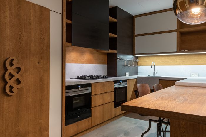 Dark timber kitchen millwork, Max Vakhtbovych on Pexels