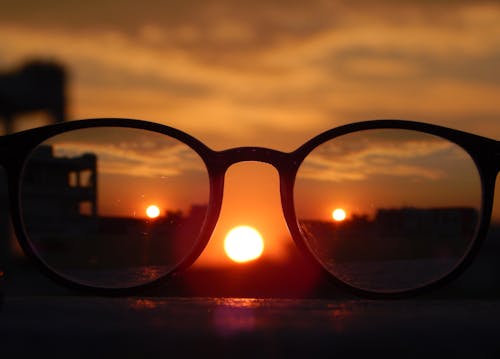 Close-up Photography of Eyeglasses at Golden Hour