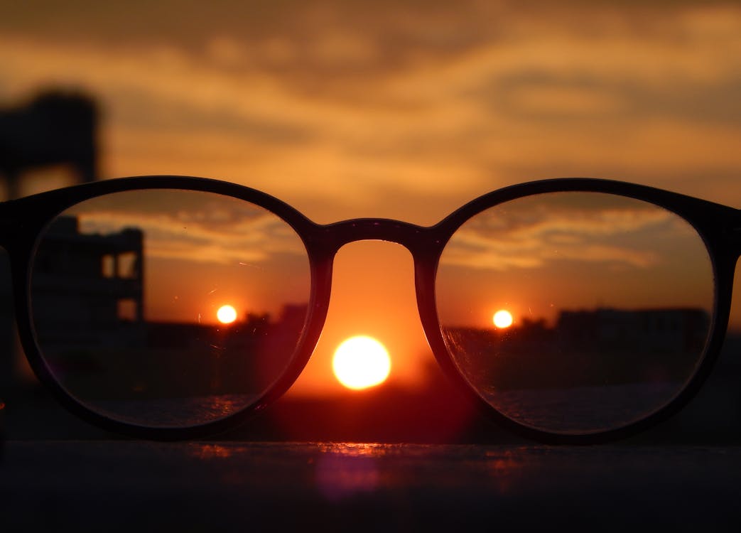 Free Close-up Photography of Eyeglasses at Golden Hour Stock Photo