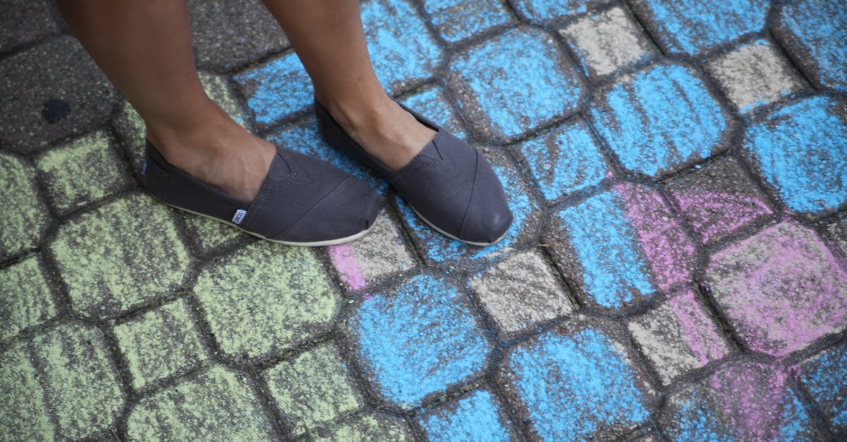Person Wearing Blue Flat Shoes