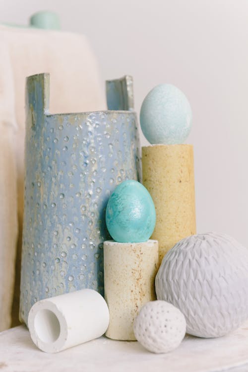 Free Cylindrical Vases and Decorative Eggs  Stock Photo