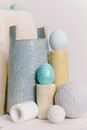 Cylindrical Vases and Decorative Eggs