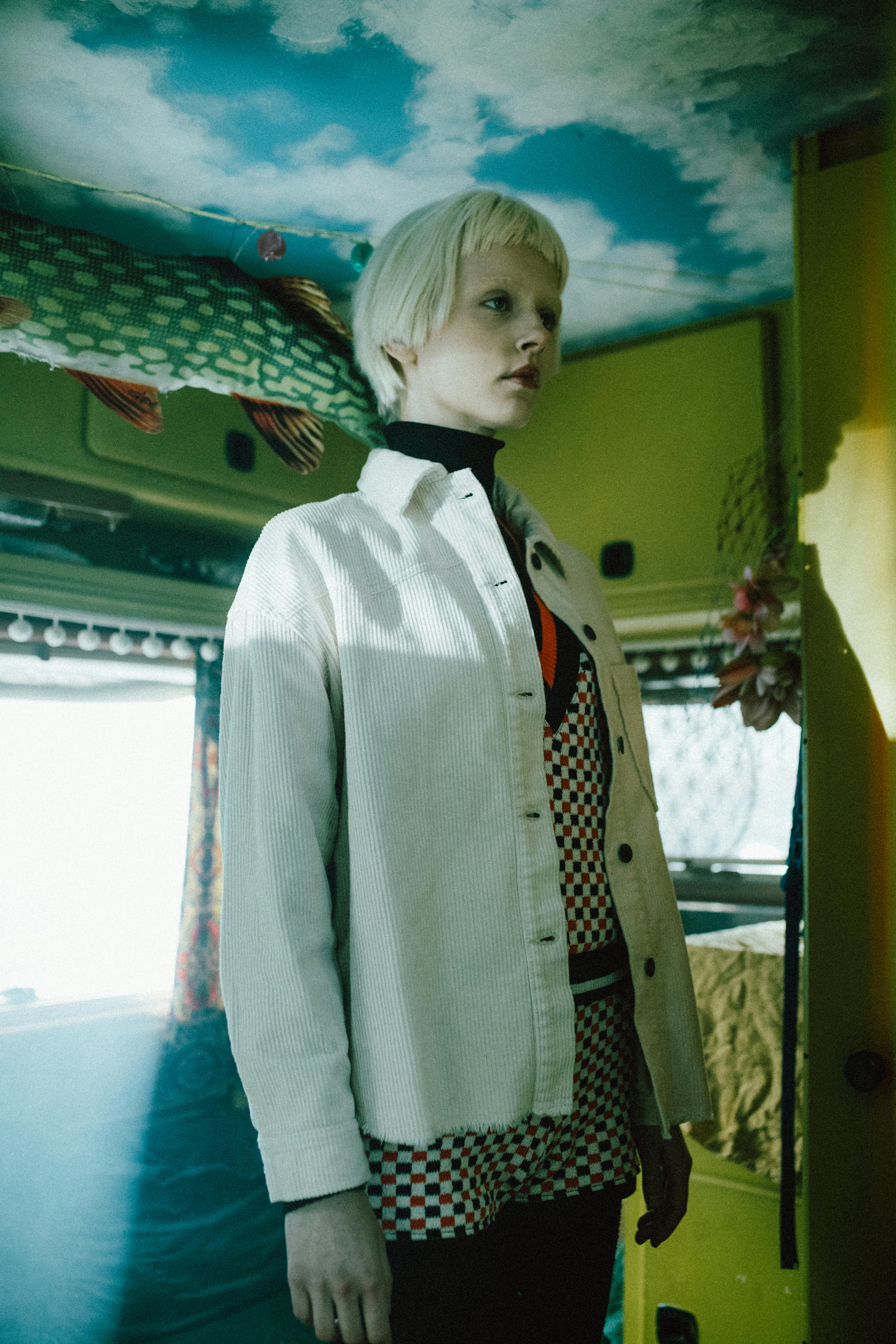 Boy in White and Black Button Up Shirt