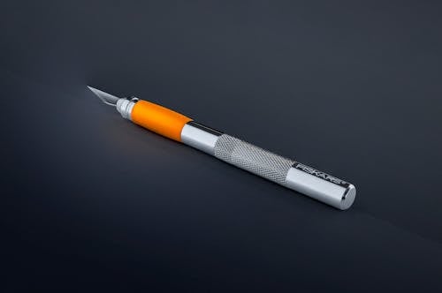 Free Gray and Orange Craft Knife Stock Photo