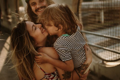 Free A Family Hugging Each Other Stock Photo