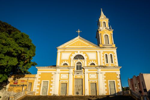 Free Beautiful exterior of historical basilica in João Pessoa, Brazil under clear blue sky. Stock Photo